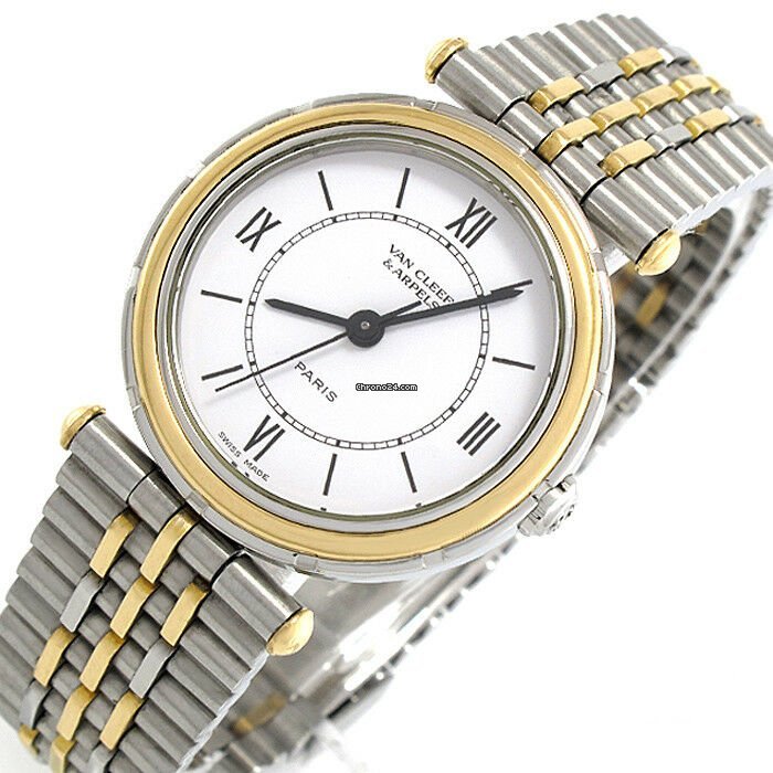 Van Cleef & Arpels La Collection steel / gold-plated quartz